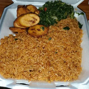 Plate full of jollof rice w/ very small serving of greens &amp; plantains!