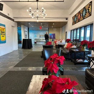 lobby area with poinsettis