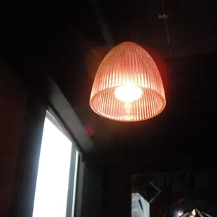 Dark inside even though there was a light above us