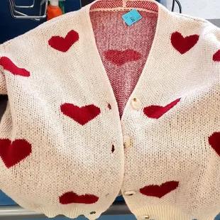 Heart sweater. White sweater with red hearts. Very cute!
