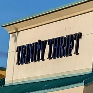 Trinity Thrift sign on the front of the store.