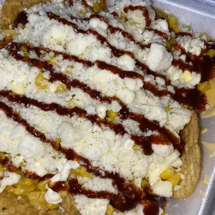 Tostitos Lokos. The corn in the Cup over Tostitos and Nacho Cheese.