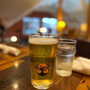 a pint of beer and a glass of water