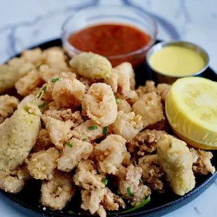 Seasoned calamari fried and served with marinara sauce