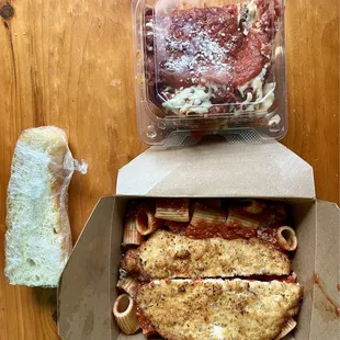 Rigatoni with Chicken cutlet in front, lasagna at 12 o'clock. All of this for $22! Better than going to an expensive Italian restaurant!