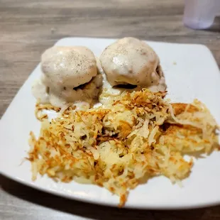 a plate of hash browns and ice cream