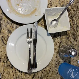Empty plates.  I couldn't eat it all. Taking it home for dinner.