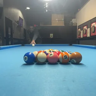 a pool table with eight billiards