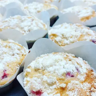 muffins with powdered sugar on top