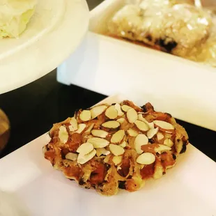 a muffin with almonds on top