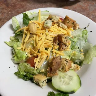 House salad with Italian dressing.