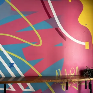 a colorful mural on a wall