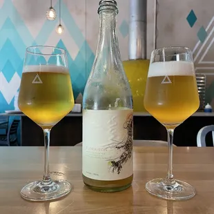 two glasses and a bottle