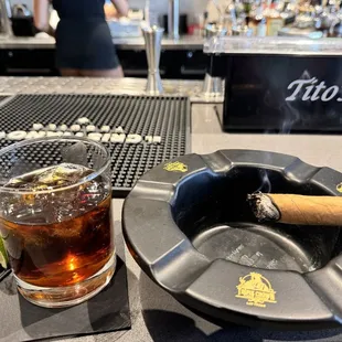 Nothing better than a cocktail and a cigar with friends