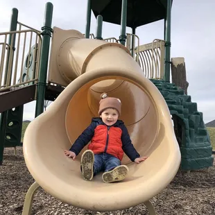 Maverick is all smiles at the Winner's Circle Park playground!