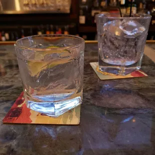 Blue Ice rocks, club soda back. Debbie has a strong pour!