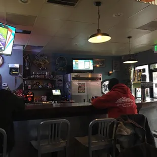people sitting at the bar