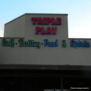 The sign in back.