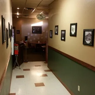 Hall to the bathrooms with pics of historical Kimball properties.