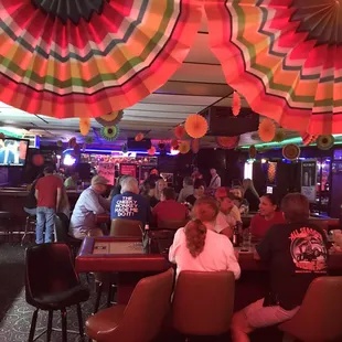people sitting at a bar