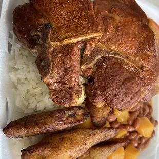 meat and rice in a styrofoam container