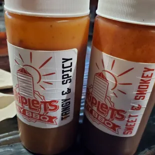 2 sauces -Tangy and Spicy (mustard and vinegar base) and Sweet and Smokey (Dr. Pepper base)