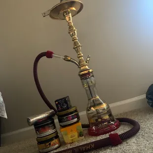 a hookah with a hookah in the background