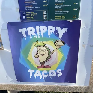 a sign for the trippy tacos
