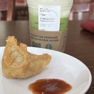 a pastry and a drink on a table