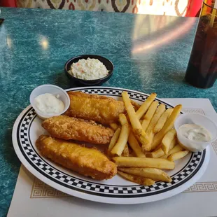 Fried cod with fries and coleslaw and extra tartar sauce