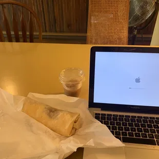 bacon burrito and iced coffee w/ oatmikj