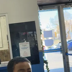 This man is just watching people walk on top on throw up and refuses to clean it