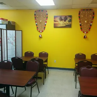 dining area with tables and chairs