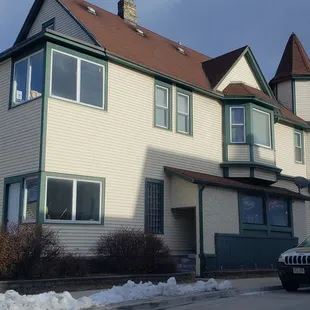 a car parked in front of a house