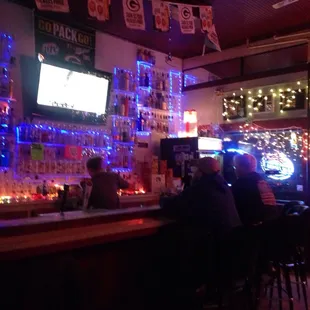 people sitting at the bar