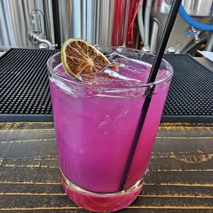 Desert Flower: Lanazul Tequila, cactus pear syrup, Triple Sec, &amp; lime juice.