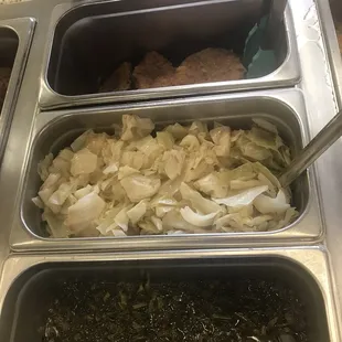 a variety of food items in trays