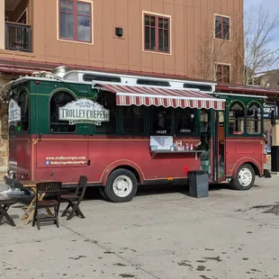 a red and green trolley