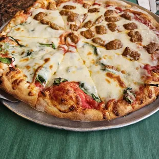 Pizza special of the day - large pie one topping $12.95!