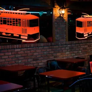 a red trolley on the wall