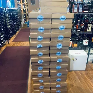 a stack of boxes of liquor