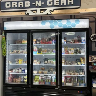 a grocery store with refrigerators