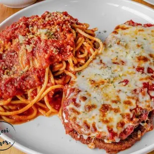 a plate of spaghetti and meat