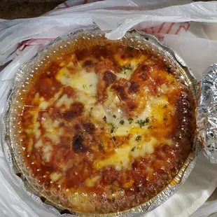 Trio pasta, (manicotti, stuffed shells, ravioli, side salad, and garlic rolls).