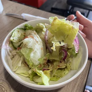 Salad with house dressing. We already ate the tomato and cucumber