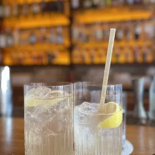 two glasses of lemonade on a table