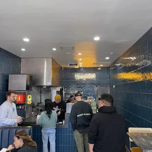 a group of people in a restaurant