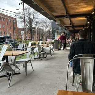 Outdoor seating on a rainy night.