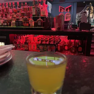 Orange tee and football