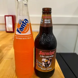a bottle of soda and a bottle of soda